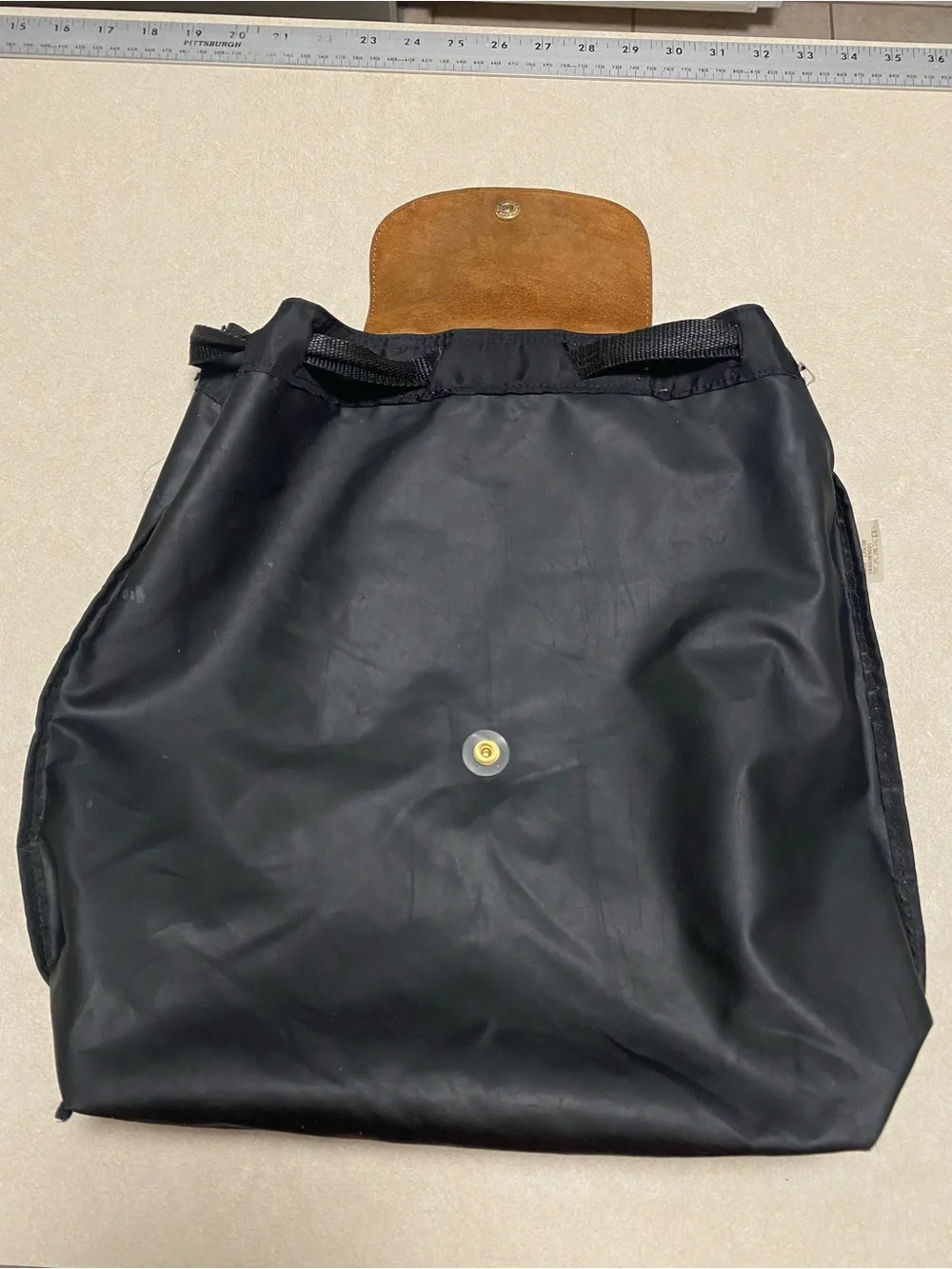 Longchamp Le Pliage Drawstring backpack Black Tan Leather 2 Way Folding NAM LIG